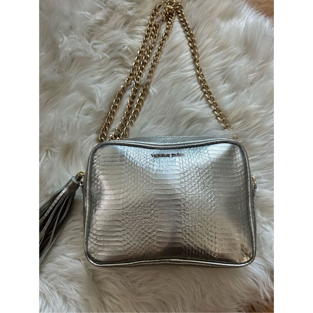 Victoria secret silver crossbody purse w gold chain and tassel